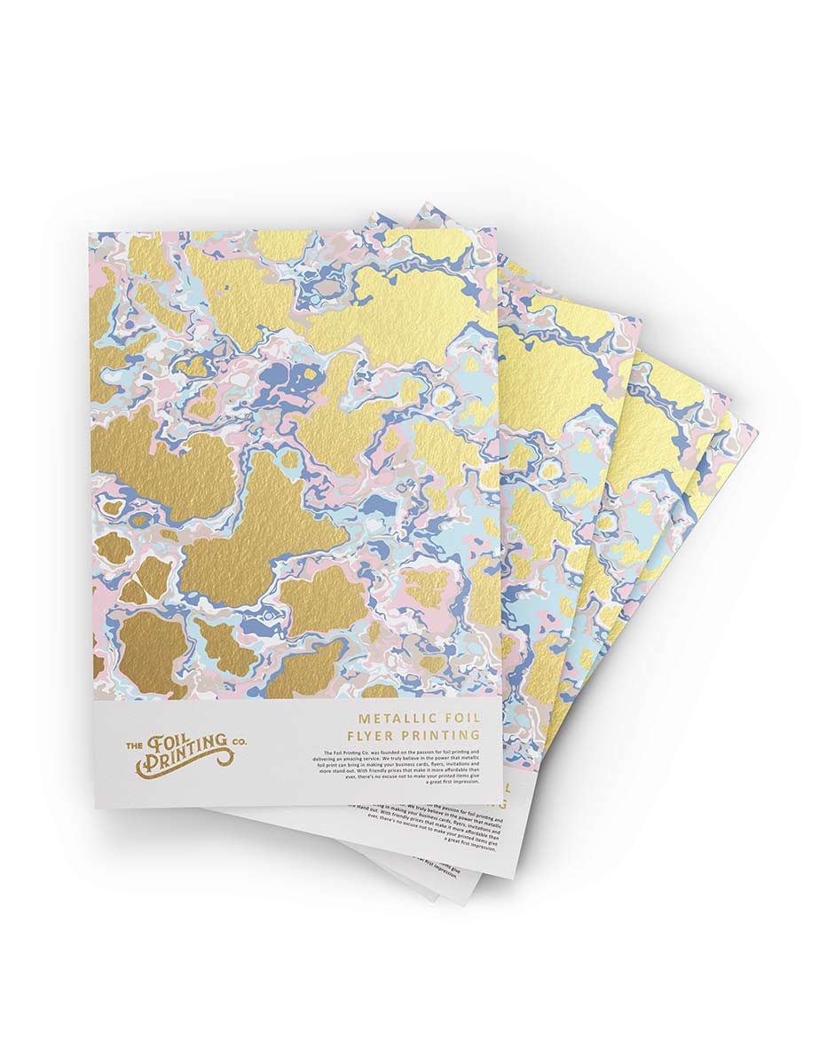 Foil flyer printing samples featuring abstract pastel and metallic gold artwork displayed as stacked promotional flyers