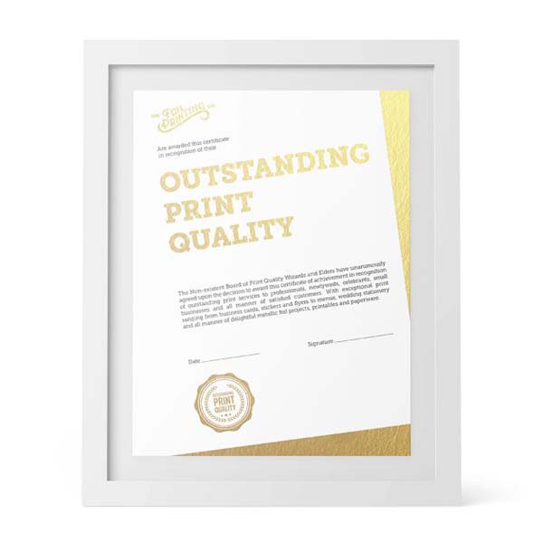 Metallic gold certificate on crisp white paper stock