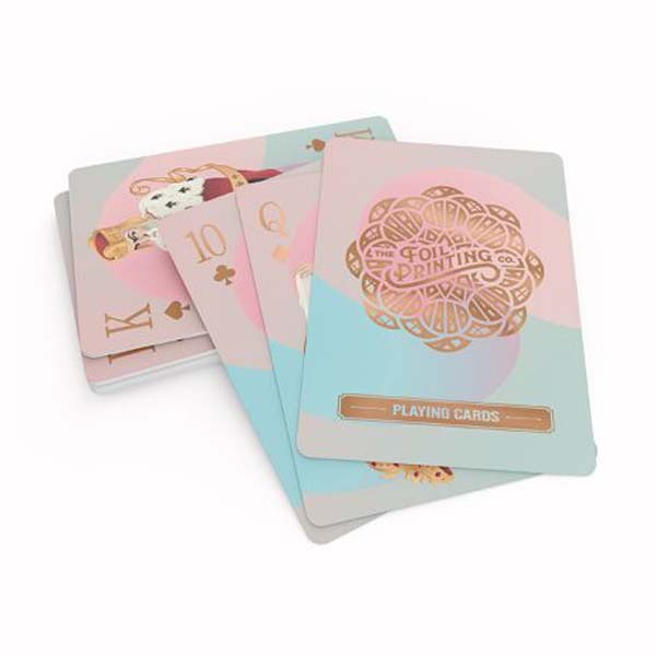 Metallic foil branded stack of playing cards with rose gold foil