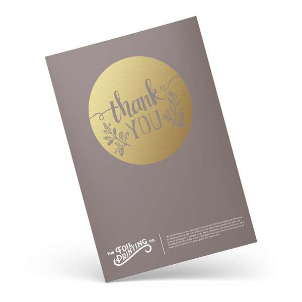 Thank you card with golden text and embellishments